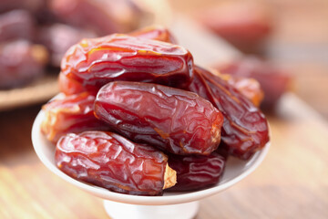 Premium Xinjiang Dates - Golden Dried Fruits on White Plate