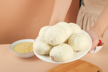 Fresh Handmade Pork Buns with Scallion and Dipping Sauce - Traditional Asian Steamed Dumplings