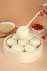 Handmade Steamed Meat Buns with Stuffing in Bamboo Steamer Traditional Chinese Dim Sum Dumplings