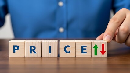 Price increase or decrease concept with wooden blocks and arrows