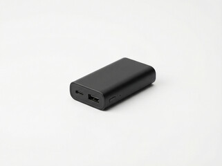 Compact rectangular matte black power bank with USB and USB-C ports isolated on a plain white studio background