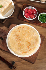 Handmade Scallion Pancake with Fresh Vegetables on Wooden Table - Traditional Asian Cuisine