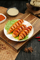 Spicy Homemade Gluten Skewers Henan Style Chinese Street Food on Wooden Board