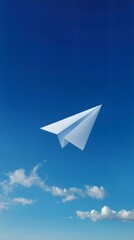 Naklejka premium White paper airplane soaring through a vibrant blue sky with fluffy white clouds, representing freedom, communication, and new beginnings