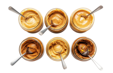 Jars of different tasty nut butters like peanut almond isolated on transparent background, png