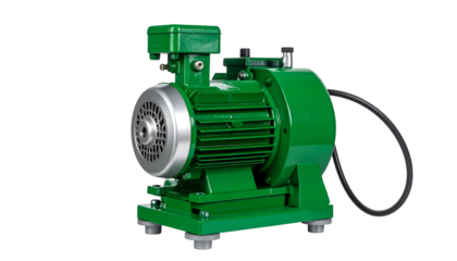 Angled shot of a bright green electric motor and pump assembly against a black background