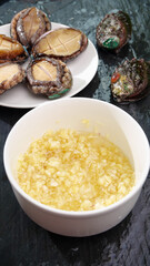 Fresh Steamed Abalone with Garlic Sauce - Traditional Asian Seafood Dish