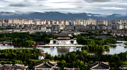 Chinese City Skyline with Traditional Pavilion, Lake and Mountains