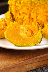 Fresh Cooked Pumpkin Slices on White Plate - Golden Orange Autumn Vegetable from Shaanxi China