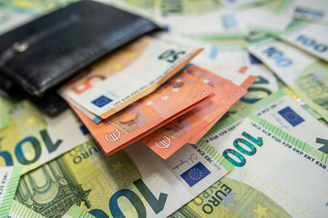 Euro cash and wallet symbol of wealth and economic balance
