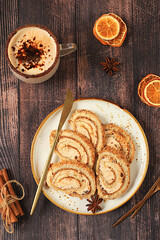 Festive Kitchen Banner. restaurant menus.Homemade winter dessert, stollen, rolls or strudel with sweet cream filling, nuts, cinnamon, cranberries and poppy seeds, and eggnog.
