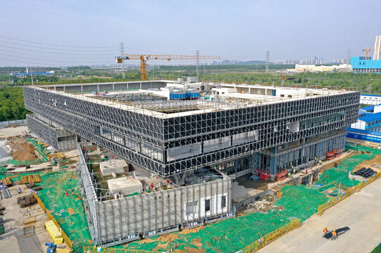 Aerial Construction Site with Steel Structure and Crane