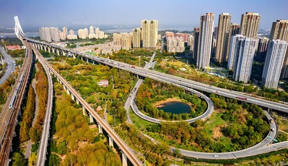 Modern City Aerial Panorama: Urban Transportation and Green Ecology Coexistence © LeVan