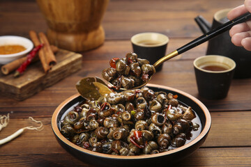 Spicy Sichuan Snail Stir-Fry Dish - Chopsticks Preparation