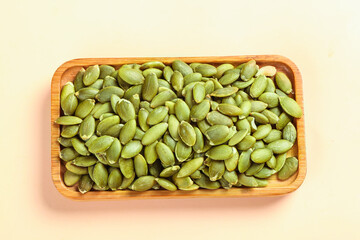 Shelled Pumpkin Seeds in Wooden Tray - Studio Food Photography
