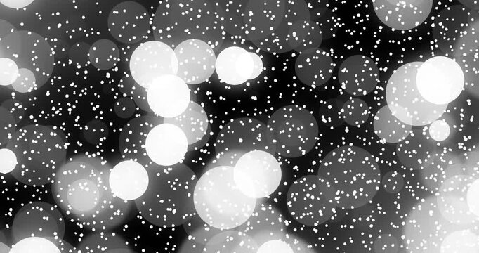 Frame one showing dense white specks bokeh orbs shifting, drifting over black backdrop evoking calm