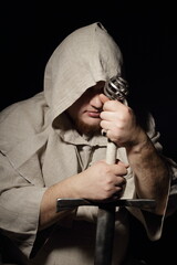 A menacing fat warrior monk with a sword