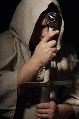 A menacing fat warrior monk with a sword