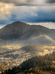 Sunny Autumn Carpathians with Puffy White Clouds