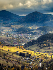 Sunny Autumn Carpathians with Puffy White Clouds
