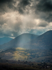 Sunny Autumn Carpathians with Puffy White Clouds