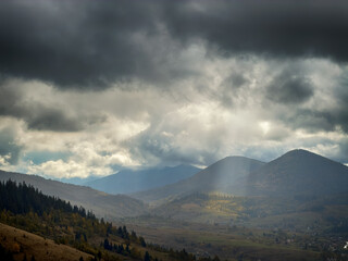 Sunny Autumn Carpathians with Puffy White Clouds