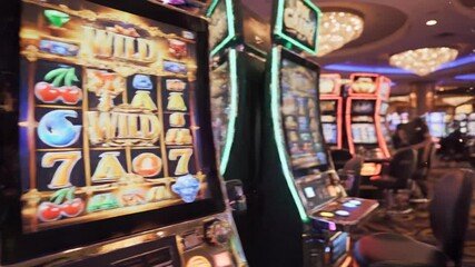 Vibrant casino slot machines come to life in a dazzling gaming room. experience the thrill of chance and excitement.