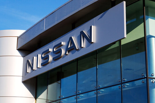 Nissan motor company logo in front of dealership building on April 12, 2025 in Prague, Czech republic.