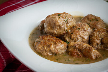 Pork meatballs with dill sauce.