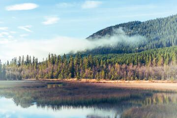 Tors&aelig;terkampen Hill seen from the Skjeppsj&oslash;en Lake, part of the Toten&aring;sen Hills, Norway, in fall.