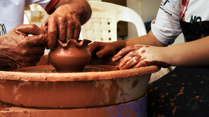 Working With Clay Pot in Ceramic Workshop