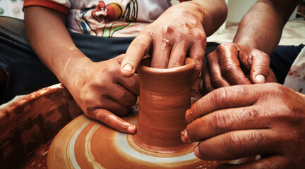 Working With Clay Pot in Ceramic Workshop