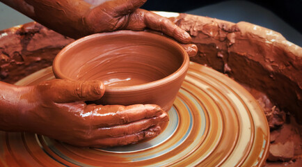Working With Clay Pot in Ceramic Workshop