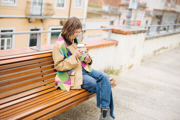 Girl browsing on phone, Young lady using mobile device on terrace