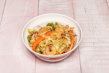 Cantonese-style shrimp chop suey with crunchy stir-fried vegetables (celery, bell pepper, bamboo shoots) and a light soy sauce, served over white rice.