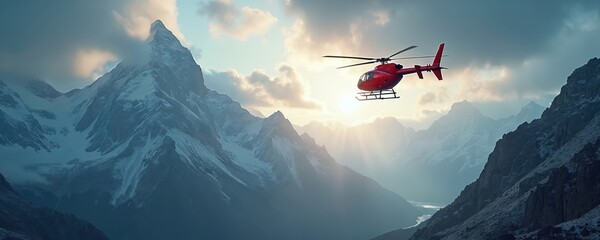 Red helicopter flies over snowy mountain range at sunrise. Sun rays break through clouds illuminating majestic landscape. Aerial transport above remote wilderness valley.