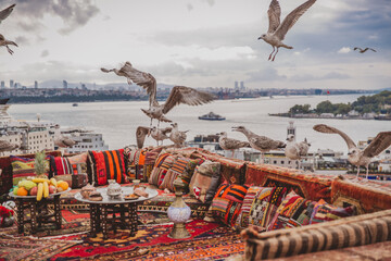 Great panoramic view of Istanbul from rooftop decorated traditional colorful ornamental pillows