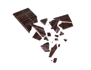 Crushed dark chocolate bar with pieces flying in the air close-up on a transparent background