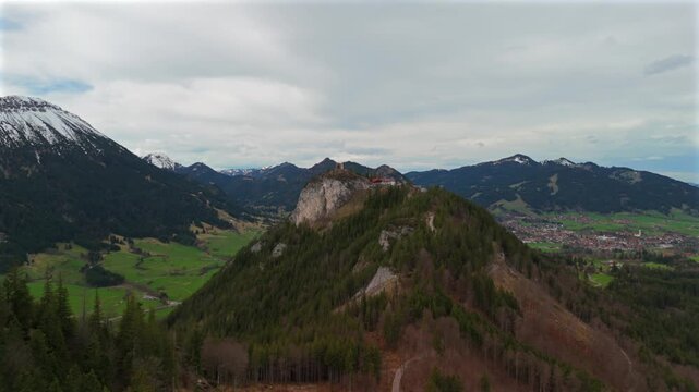 Aerial view Burgruine Falkenstein is ruined medieval castle in Pfronten in Ostallgau in Sudwest Bayern, Germany near Fussen. Drone view of ruins of tallest castle in Germany Falkenstein. King Ludwig. 