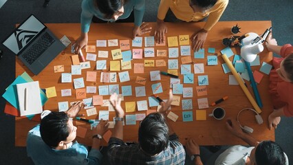 Top view of smart project manager talking and explain idea and clapping idea. Aerial view of business people applause to successful project. Aerial view of team clap hands at meeting room. Symposium.