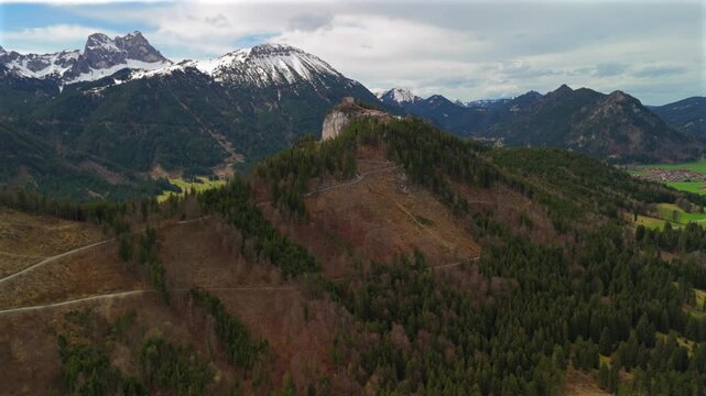 Aerial view Burgruine Falkenstein is ruined medieval castle in Pfronten in Ostallgau in Sudwest Bayern, Germany near Fussen. Drone view of ruins of tallest castle in Germany Falkenstein. King Ludwig. 