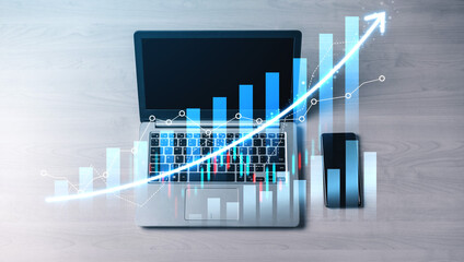 A sleek laptop on a wooden desk features a vibrant digital graph illustrating growth. Ideal for business, finance, and technology-related themes. Scalp