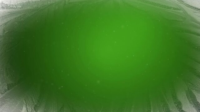 festive Christmas holiday snow and ice themed animated motion background with falling light snow gently falling over a green background with a white ice patterned border vignette frame border 4K