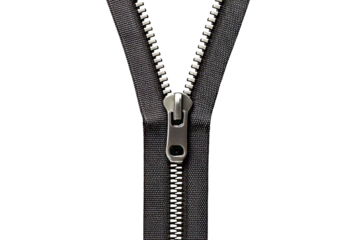 Close-up of a partially opened dark gray zipper against a white background.  Ideal for fashion, textile, and design projects needing a detailed texture shot.