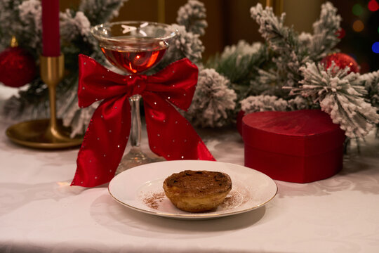Pastel de Nata Dessert with Liquor in Holiday Decorations