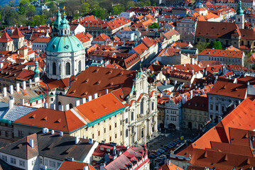 Aerial view of Church of Saint Nicholas and Lesser Town (Mala Strana) in Prague, Czech Republic....