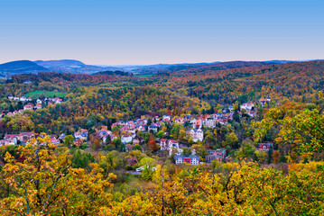 Eisenach town with colorful houses surrounded by autumn forest, Germany