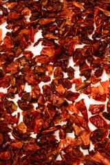 Dried tomatoes isolated on a white background.