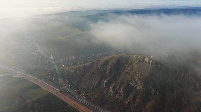 Scenic drone footage in late autumn over the Soimos Fortress in Arad County, Romania, Europe	