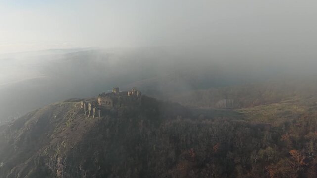Scenic drone footage in late autumn over the Soimos Fortress in Arad County, Romania, Europe